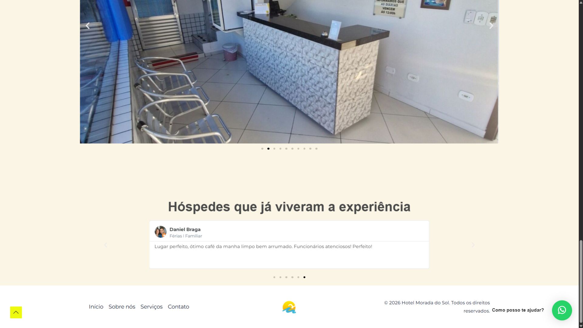Área de recepção do Hotel Morada do Sol Ipanema com balcão de atendimento.